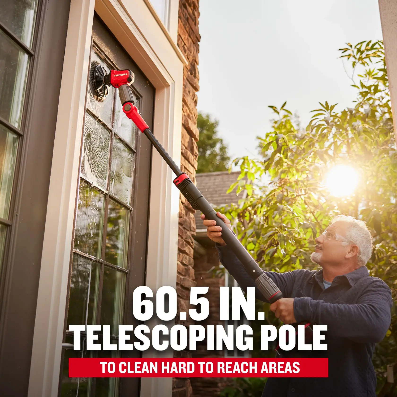 V20 Scrubber Brush man cleaning window with extension pole graphic