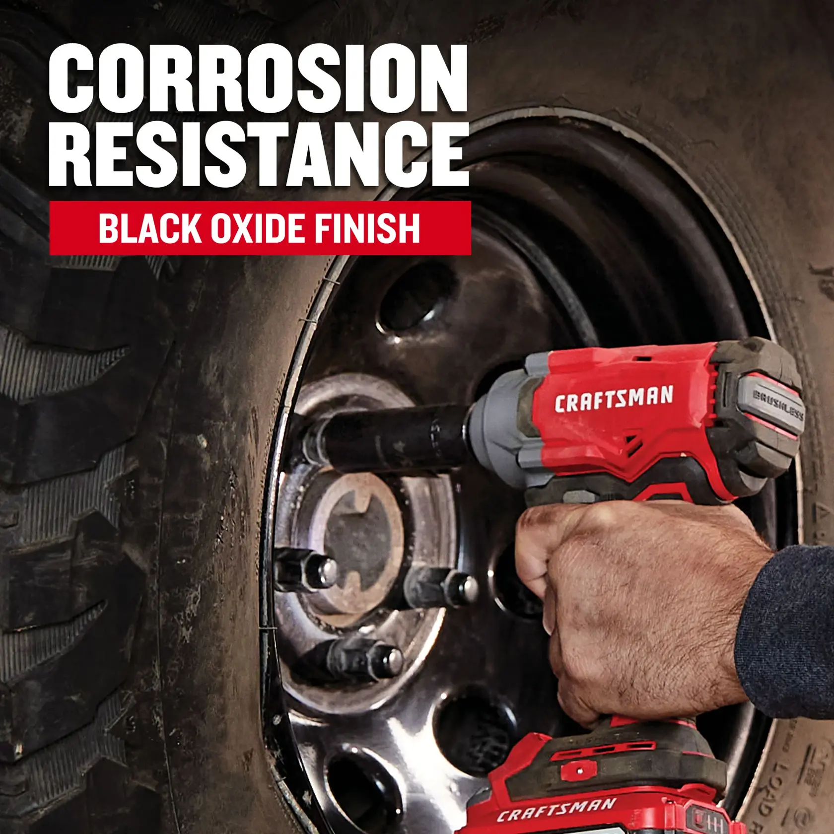 Photo of Craftsman impact driver used on vehicle wheel, showing black oxide finish. CMMT16062.