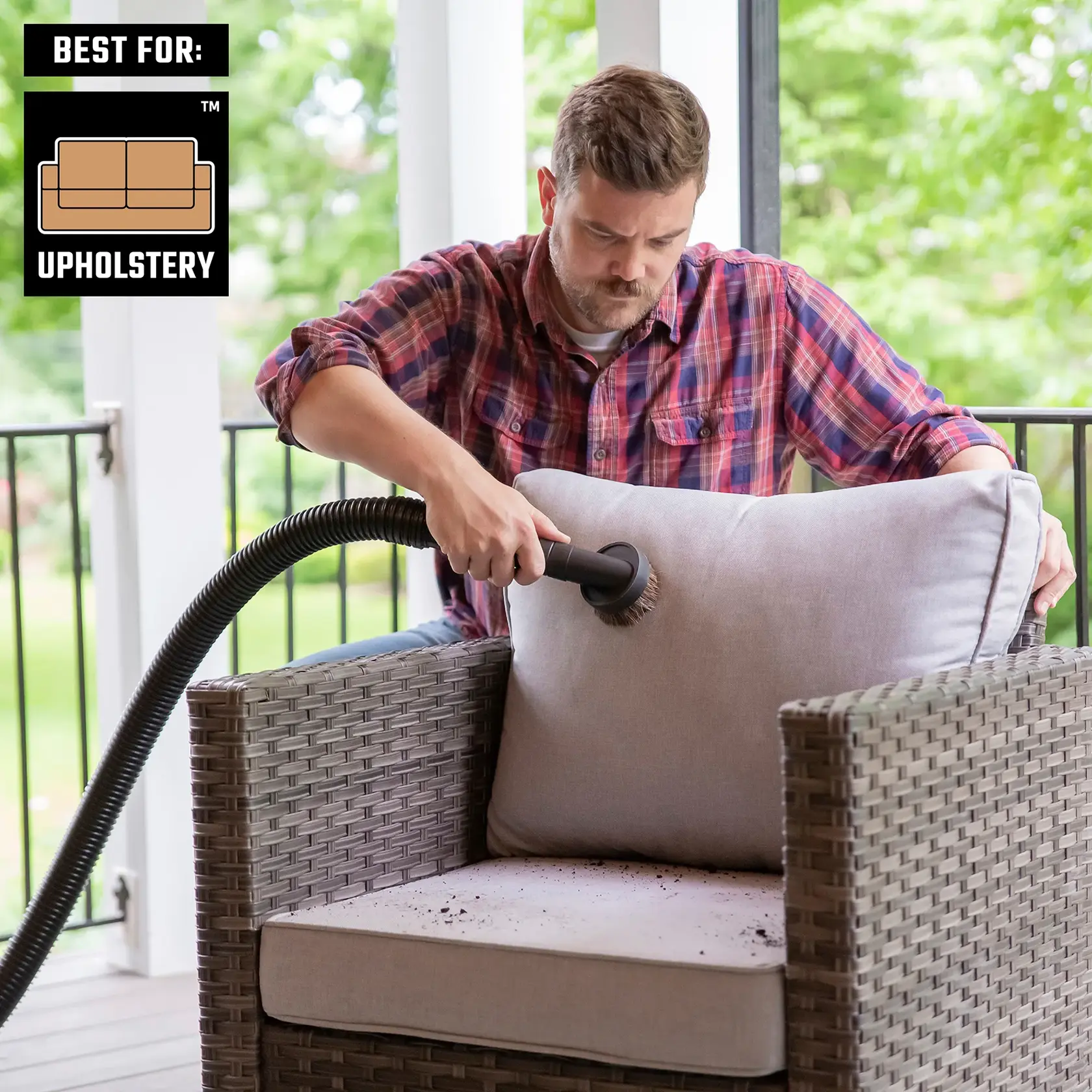 Photo of Craftsman upholstery vacuum brush cleaning cushion, SKU CMXZVBE38785, outdoor chair setting.