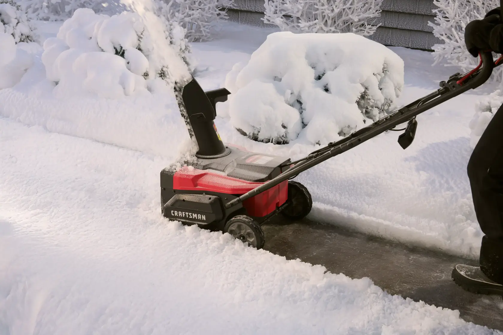 Close up sidewalk path clearing with CRAFTSMAN 2x20V 18" Snow Blowerv