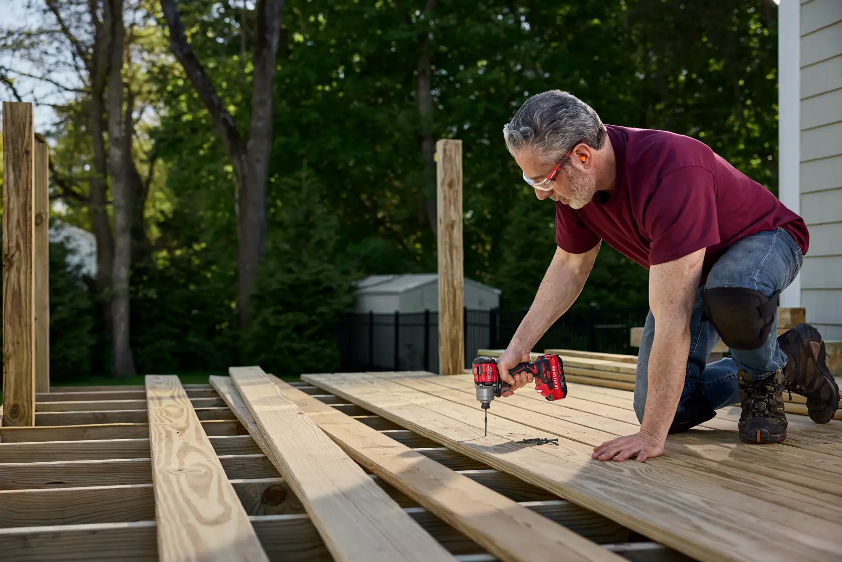 CRAFTSMAN V20* Impact Driver securing Fastener in Deck Boards