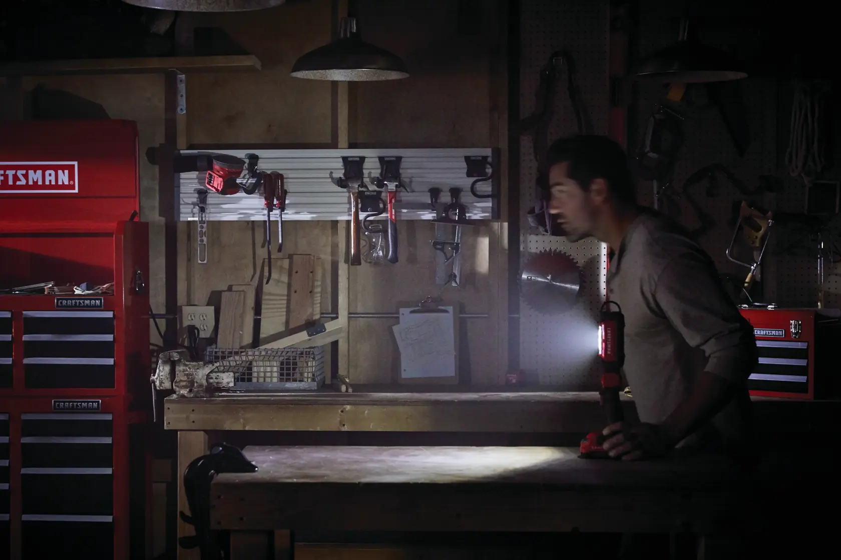 Cordless led hanging work light tool only being used to light the workshop.