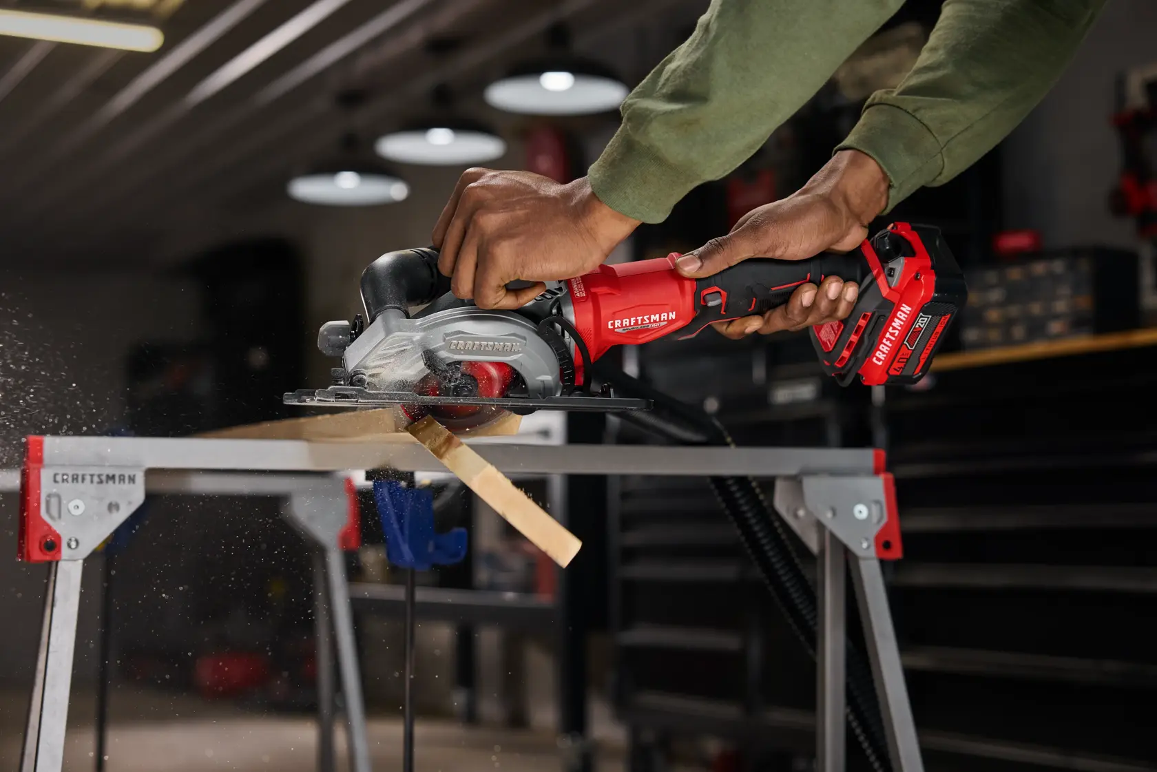 CRAFTSMAN V20* RP 4.5” Circular Saw cutting through 2x4 showing vacuum
attachment