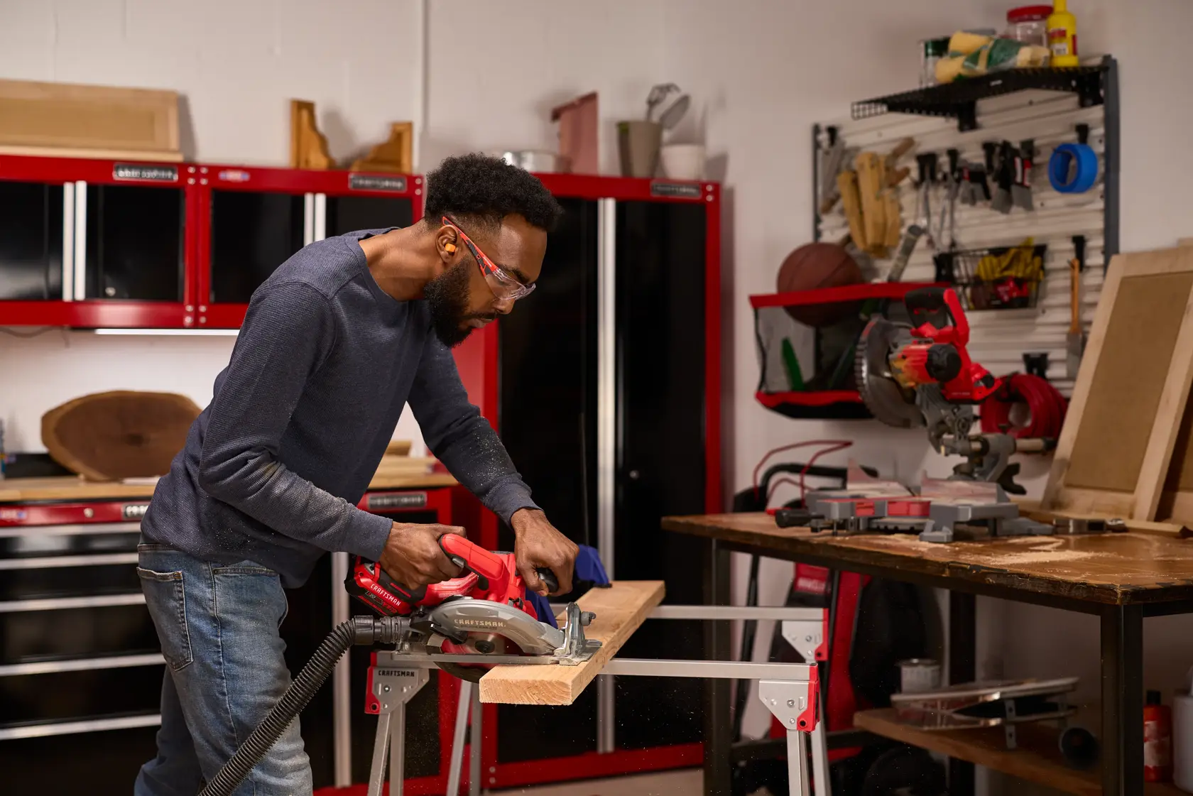 Photo of Craftsman cordless circular saw CMCS551B cutting wood outdoors.