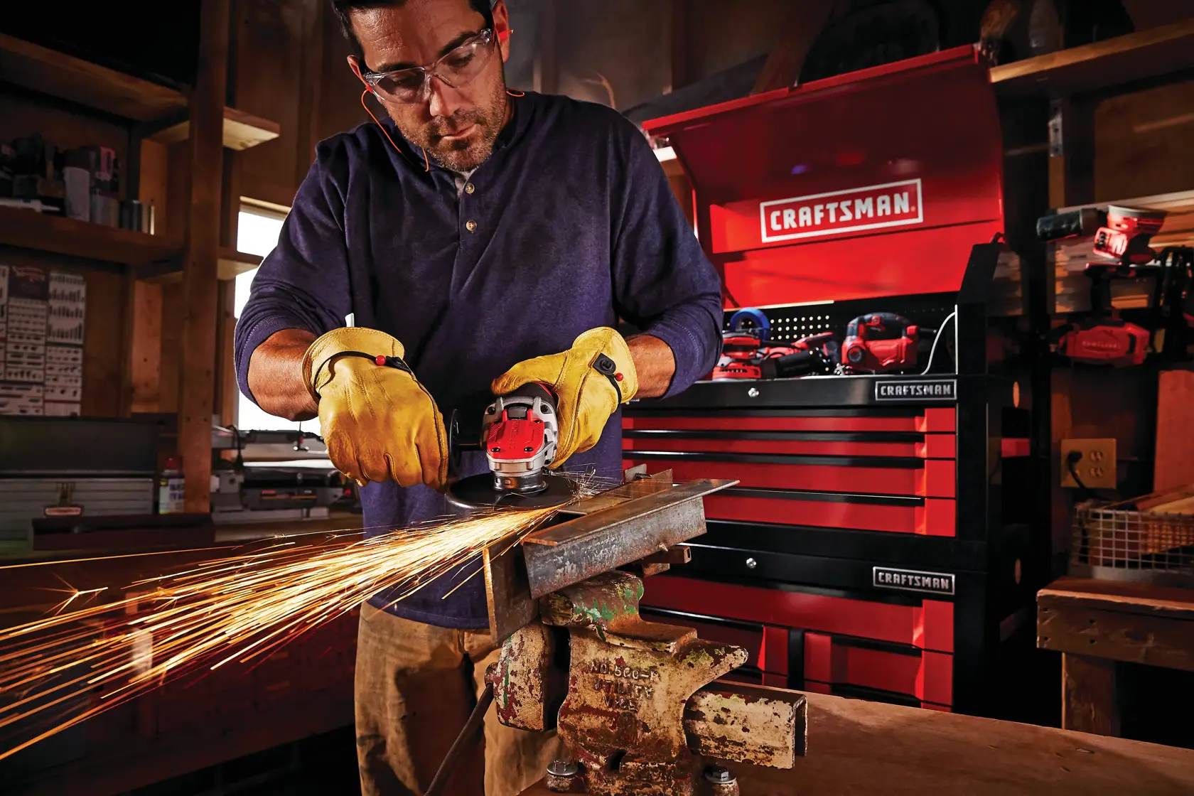 7 dot 5 amp four and a half inch small angle grinder being used by a person.